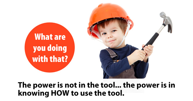 Boy with a hardhat and hammer highlighting the power is not in the tool
